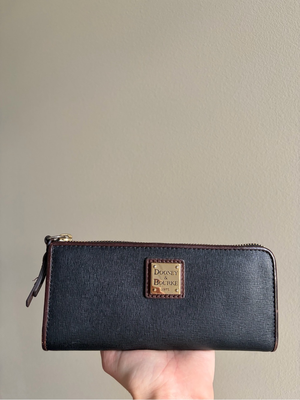 Dooney & Bourke Black Leather Zip Wallet with Brown Trim